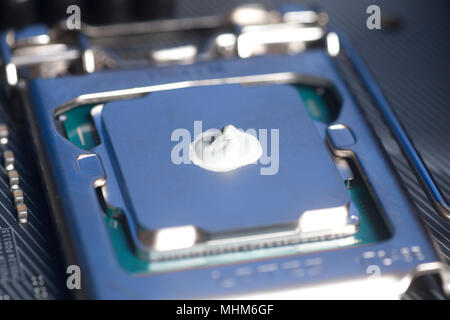 CPU with thermal paste applied. Close up. Stock Photo