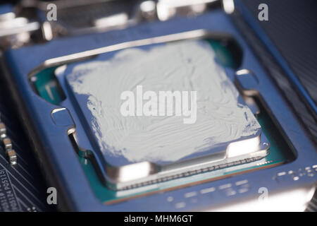CPU with thermal paste applied. Close up Stock Photo