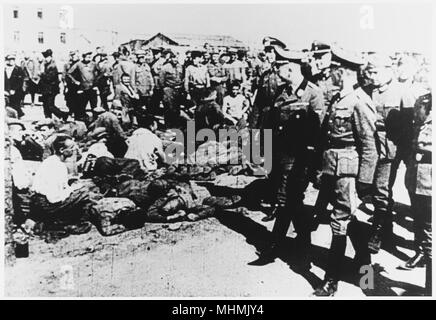 Himmler visits a Russian Prisoner of War camp from which prisoners were transported to Germany for hard labour or shot - including civilians.     Date: C.1941
