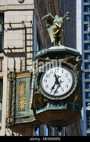 The 1926 'Father Time' clock located outside the Jeweler's Building in Chicago's downtown Loop business district. Stock Photo