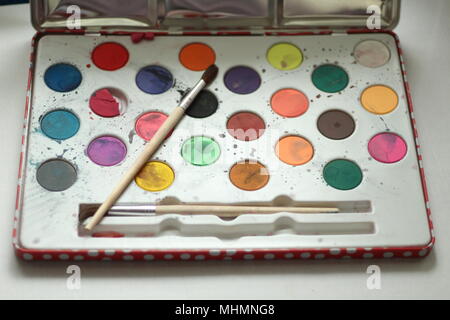 Children's watercolour paintbox and brush Stock Photo