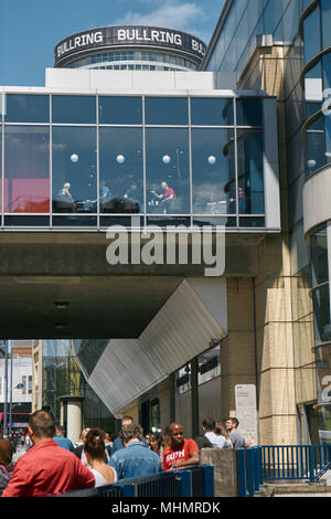 Street scene with a section of the the exterior of the Birmingham Bull Ring shopping centre Stock Photo