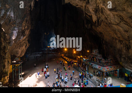 Batu Caves, one of the popular Hindu shrines outside India, and is dedicated to Lord Murugan. It is the focal point of Hindu festival of Thaipusam. Stock Photo