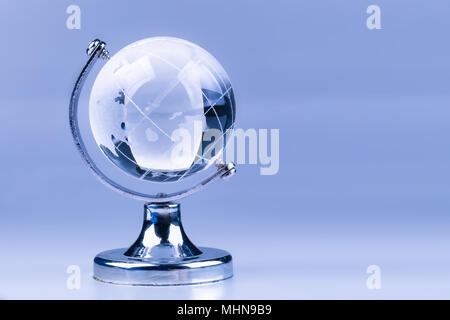 Globe is made of glass isolated on a white background. Stock Photo