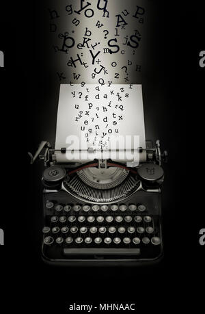 Fantasy composition of letters falling down on typewriter over blank page. Black background and light effect on white page. Stock Photo