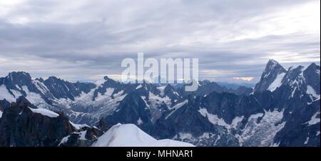 panorama view of the French Alps near Chamonix with the Midi Plan Ridge in the foreground Stock Photo