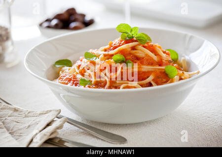 Bowl of pasta with homemade organic tomato sauce Stock Photo