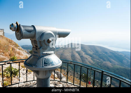 Binoculars near Monastery dedicated to the transfiguration of Christ at the top of Mount Pantokrator, Corfu, Ionian Islands, Greece Stock Photo