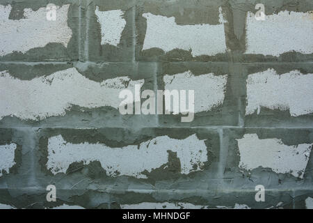 Gray wall of foam blocks on glutinous solution 2018 Stock Photo