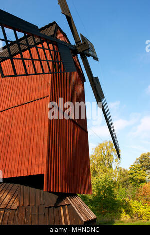 The windmill  at Kvarnvagen, Lidingo, Sweden, previously used for grinding grain into flour. Stock Photo