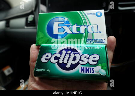 Sugar free Wrigley's Extra Spearmint chewing gum and  Eclipse Fresh Breath Spearmint flavoured mints Stock Photo