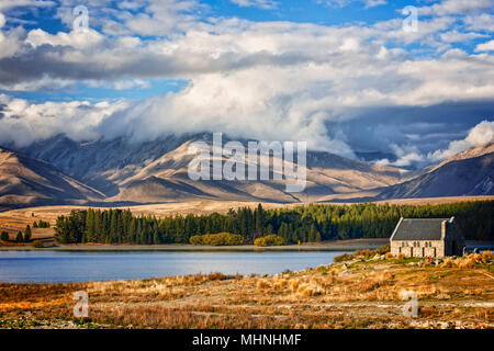 Lake Tekapo and the Church of the Good Shepherd, Canterbury, New Zealand, and the Two Thumb Range. Tekapo is a popular tourist destination. Stock Photo