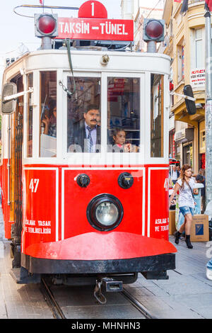 istanbul, Turkey-8th October 2011: Retro tram on Istiklal Caddesi. The tram runs to Taksim Square . Stock Photo