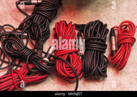 Musical Instrument Cables Pluged In Cables to Microphones and Musical Instruments on the Back of Digital ...