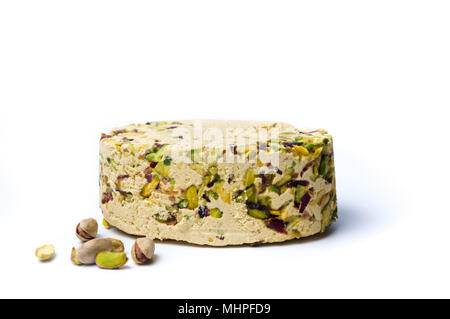 Halva with pistachio isolated on white background Stock Photo