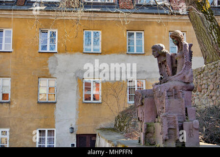 WARSAW, POLAND - APRIL 28, 2018: The statue of Wars and Sava, the legendary founders of the city or a pair of insurgents, is depicted in the sculpture Stock Photo