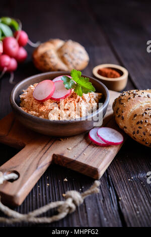 Obatzda - traditional Bavarian spread made of Camembert cheese, onion, butter, paprika powder and beer Stock Photo