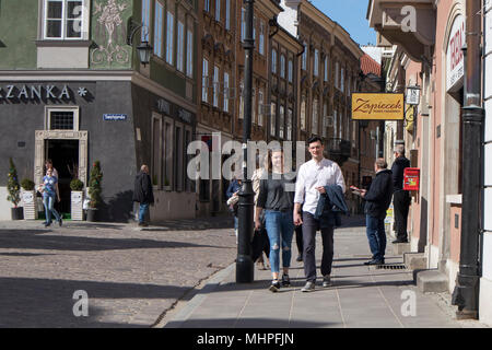 WARSAW, POLAND - APRIL 28, 2018: people on the street of old town Stock Photo