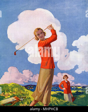 Two young lady golfers enjoying a round on a summer day Stock Photo