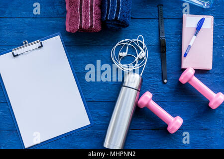 Blank paper with fitness equipment for exercise concept Stock Photo