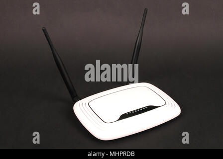 Modern Wireless Wifi Router With Two Antennas Isolated On White Background.  High Speed Internet Connection, Computer Network And Telecommunication  Technology Concept. Stock Photo, Picture and Royalty Free Image. Image  31949107.