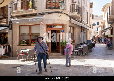 A street scene in Pollensa town, Mallorca, Spain. Stock Photo