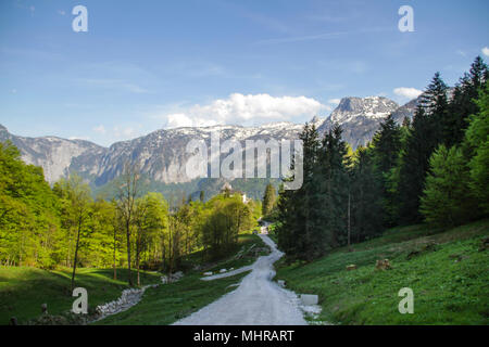 Old road through the mountains Stock Photo