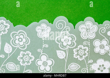 White wedding invitation with flowers lace illustration on green background. Close-up horizontal shot. cute and beautiful elements. Stock Photo