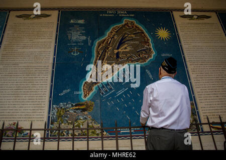 U.S. Marine Corps Chief Warrant Officer 4 Hershel 'Woody' Williams (Ret.) observes a mosaic map of the Battle of Iwo Jima, National Memorial Cemetary of the Pacific, Honolulu HI, March 17, 2018. Williams traveled to Oahu to participate in various events and visit the graves of World War II veterans that made the ultimate sacrifice. (U.S. Marine Corps Stock Photo