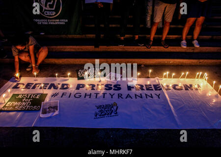 Quezon City, Philippines. 3rd May, 2018. Filipino student activists light candles as they rally at the University of the Philippines in Quezon City in commemoration of World Press Freedom Day on Thursday. May 3, 2018. The groups protest against the current administration's issues such as spreading fake news, human rights and press freedom violations. Credit: Basilio H. Sepe/ZUMA Wire/Alamy Live News Stock Photo