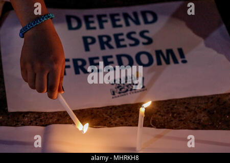 Philippines. 3rd May, 2018. Filipino student activists light candles as they rally at the University of the Philippines in Quezon City in commemoration of World Press Freedom Day on Thursday. May 3, 2018. The groups protest against the current administration's issues such as spreading fake news, human rights and press freedom violations. Credit: Basilio H. Sepe/ZUMA Wire/Alamy Live News Stock Photo