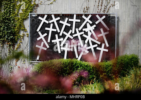 03 May 2018, Germany, Duisburg: White crosses hang at the memorial site for the 21 victims of the Loveparade. On 24 July 2010 21 young people died in a scramble during the techno parade. Photo: Ina Fassbender/dpa Stock Photo