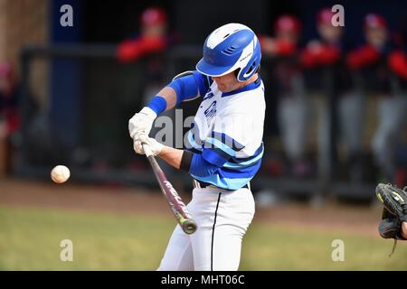 Batter swinging at a pitch during a high school baseball game. USA. Stock Photo
