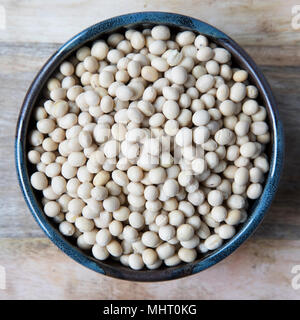 Close up of bowl of dry soybeans view from directly above Stock Photo