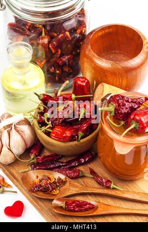 Fresh made Chili Sauce. Red peppers marinated with chilli and garlic. Sale of spices. Food ingredients Stock Photo