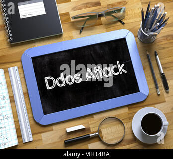 Ddos Attack Concept on Small Chalkboard. Stock Photo