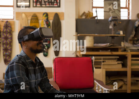 Man using virtual reality headset Stock Photo