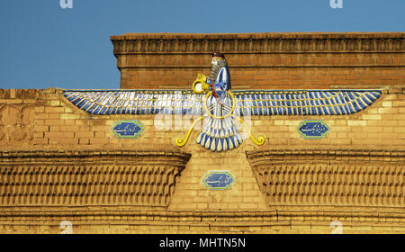 Faravahar, zoroastrian symbol on the temple wall, Yazd, Iran Stock Photo