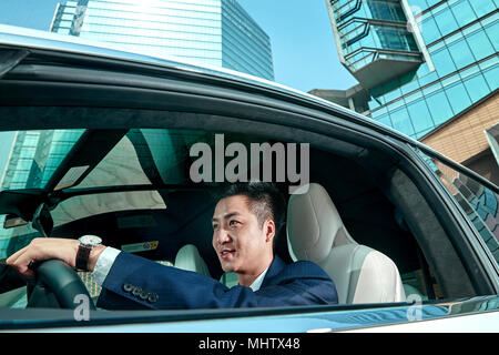 The business man driving a car Stock Photo