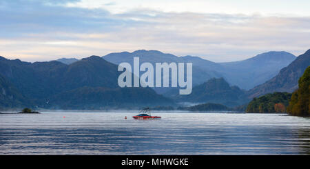 Looking south over Derwent Water at dawn from Keswick in the Lake District National Park in Cumbria, England Stock Photo