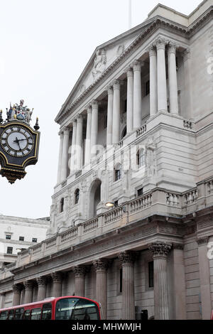 Bank of England building exterior columns and clock on Threadneedle Street in the financial district in City of London England UK  KATHY DEWITT Stock Photo