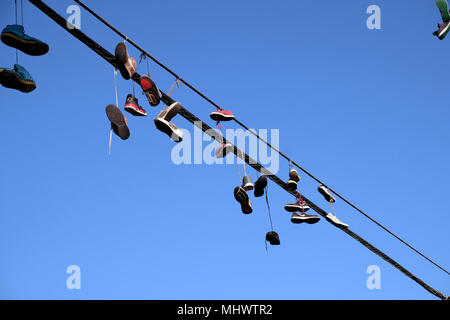 sneakers dangling from power line In and around Venice Beach Los Angeles Stock Photo