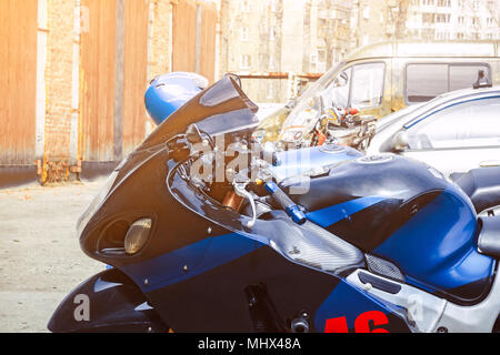 Motorcycle tire great bike-closeup of the front wheel of a large bike on the streets of Superbike technology and transport background concept Stock Photo