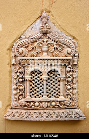 Beautiful window in a church in Anatoli village, one of the most beautiful mountainous villages of Ierapetra municipality, Lasithi, Crete, Greece. Stock Photo