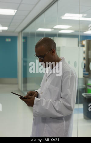 Scientist using digital tablet Stock Photo