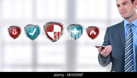 Antivirus security protection shields and man with phone Stock Photo