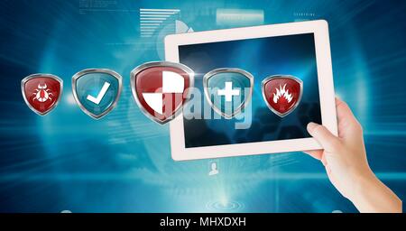 Antivirus security protection shields and hand holding tablet Stock Photo