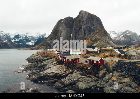 Tipical red fishing houses in a Harbor on Lofoten islands, Norway Stock Photo