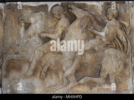 West frieze of Parthenon, Acropolis of Athens. Greece. Block W X, figures 18-19. Two horsemen. This block may have been sculpted by Agorakritos from Paros, pupil of the sculptor Phidias. Acropolis Museum. Athens. Greece. Stock Photo