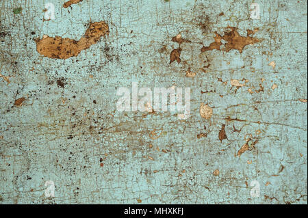 Cracked blue paint on an old wooden surface Stock Photo